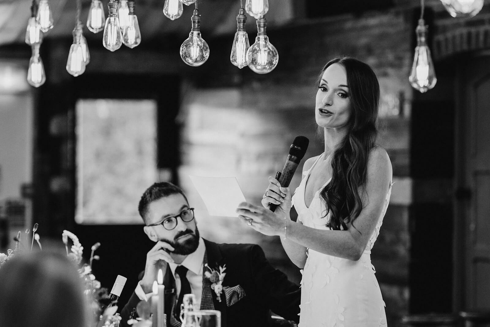 Bride delivering her own wedding speech