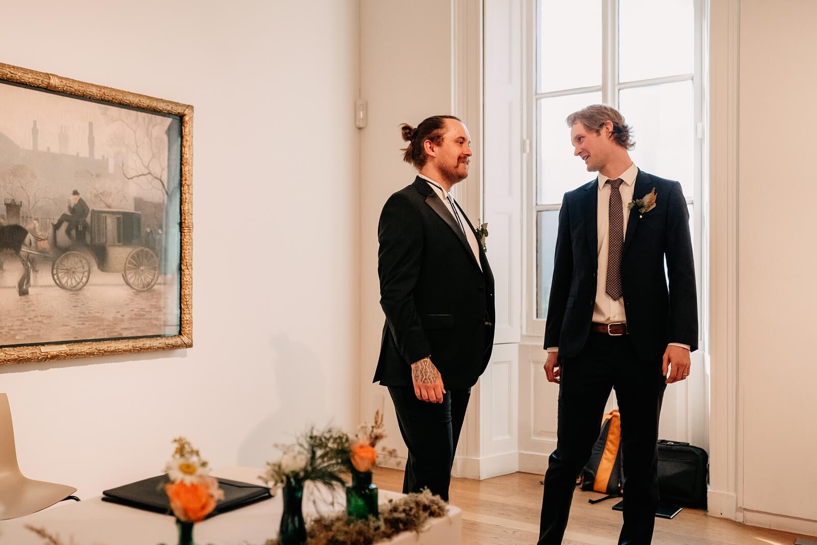 The groom and best man at the ceremony