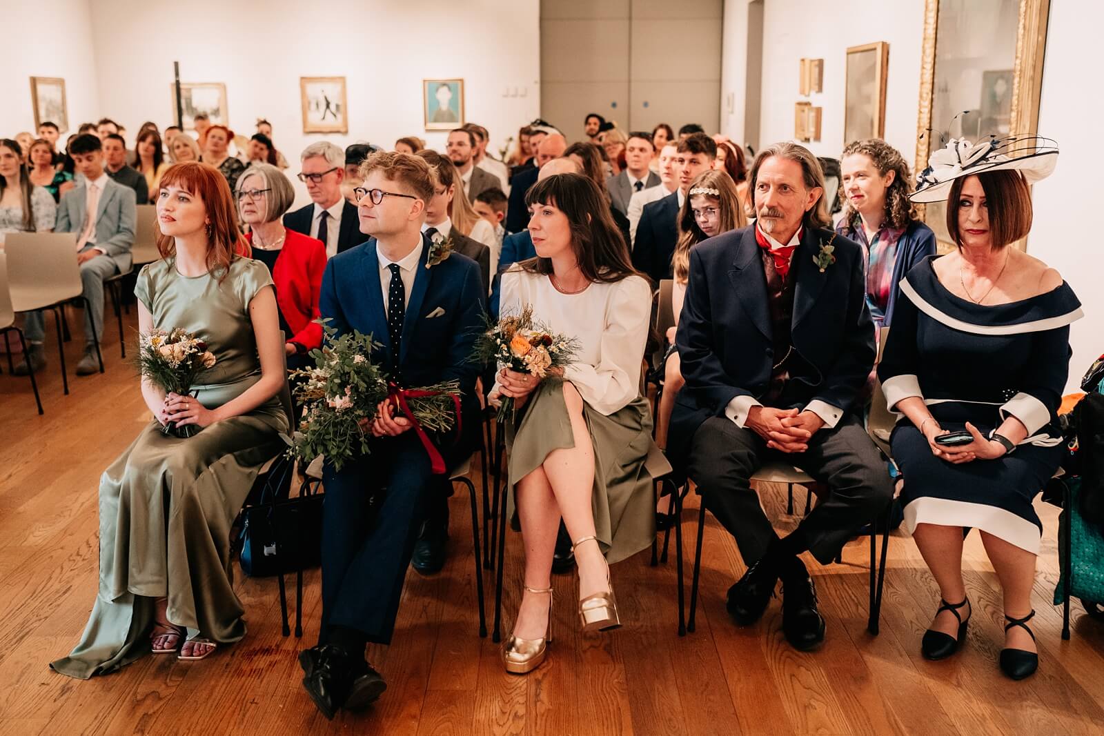 Guests watching the ceremony at Manchester art gallery