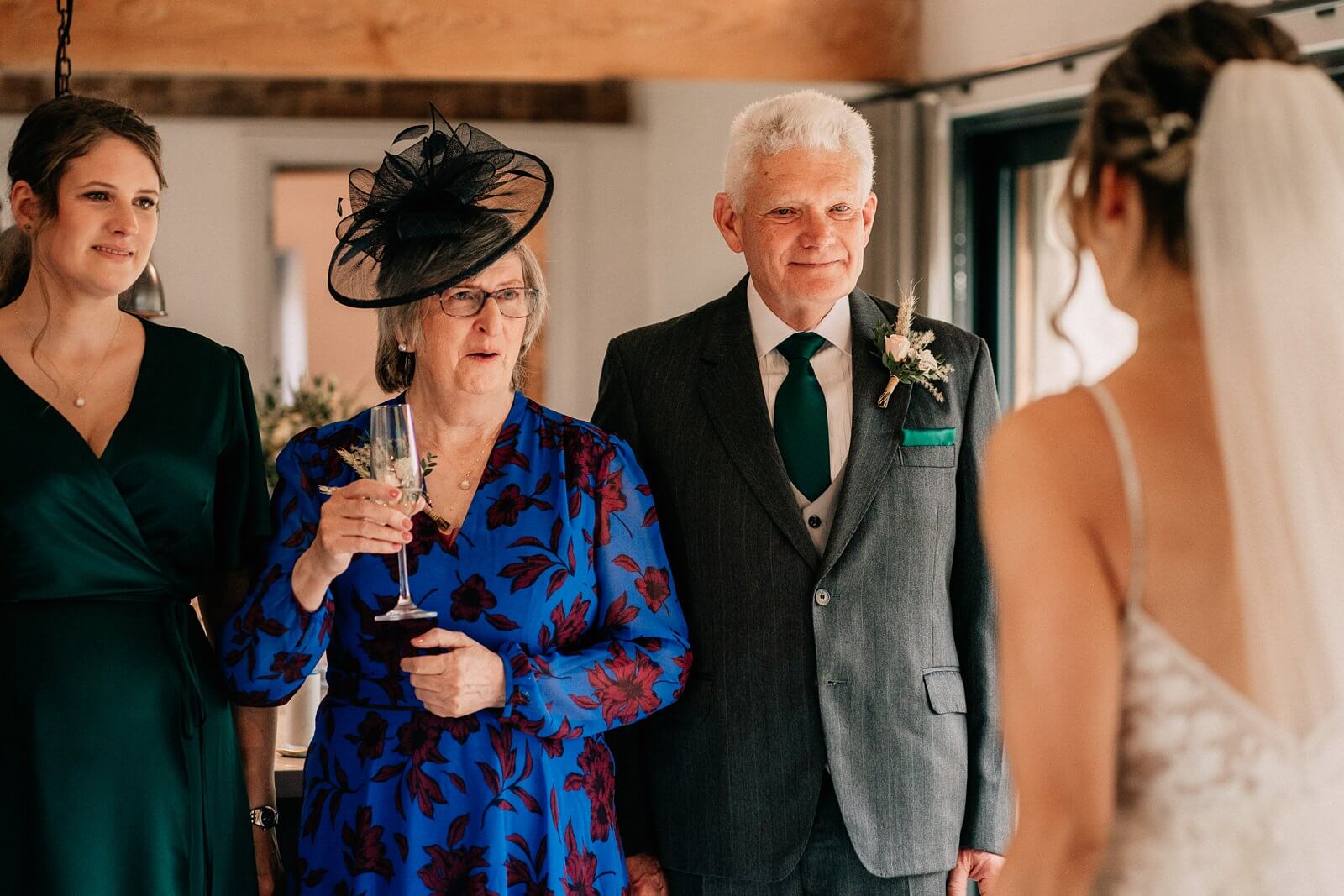 Parents reaction to the bride's dress