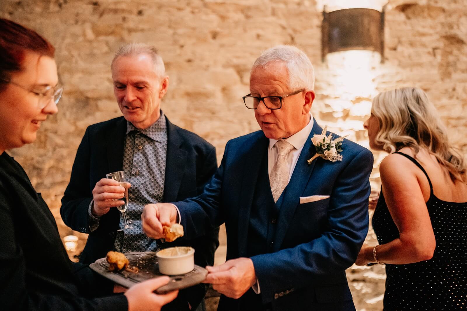 Natural photo of guests at the barn wedding