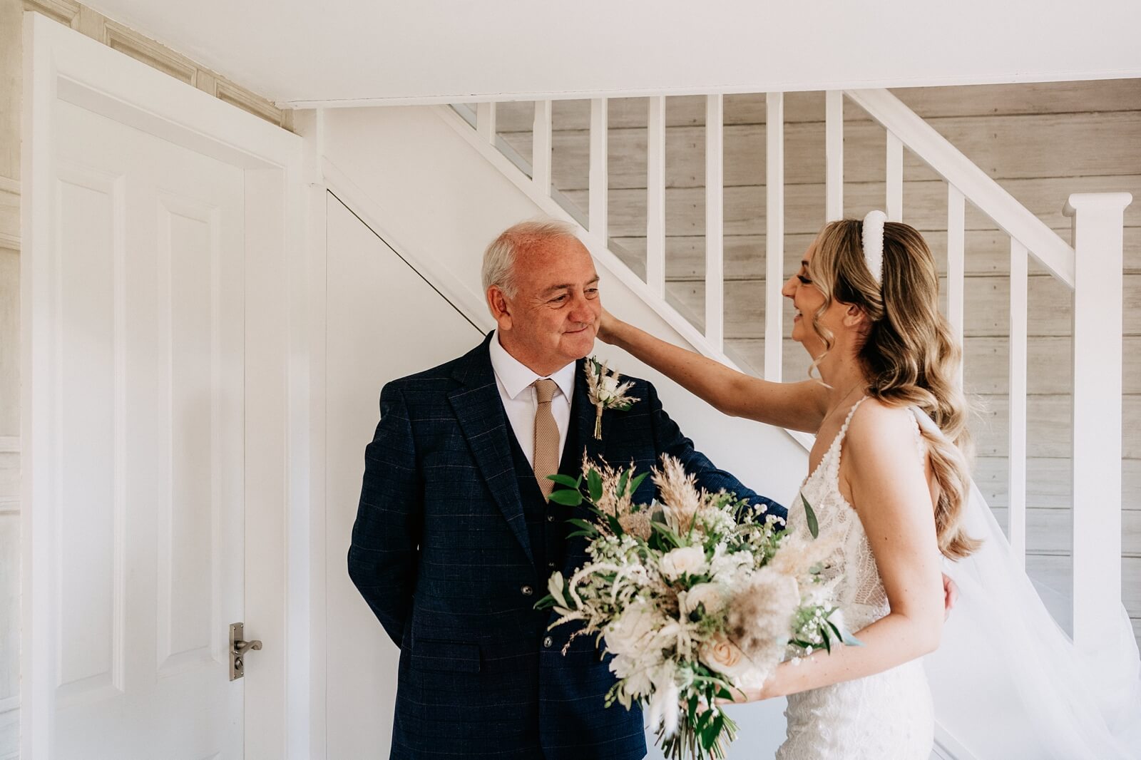 Father's first look of the bride